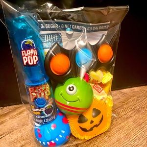 A treat bag for anyone  Light up pop , G bears, balls, pop it key chain & more